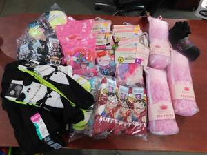 lot 44 image: Clothing, socks, tshirts, leggings, spa poufs, novelty toys, etc