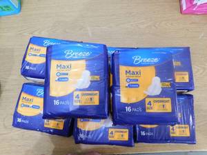 lot 238 image: (8) Breeze MAxio Overnight Pads 16ct.
