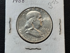 lot 112 image: 1958 Franklin Half Dollar