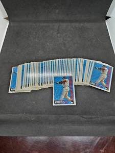 lot 100 image: (50) 1994 Topps Kirby Puckett Card #607