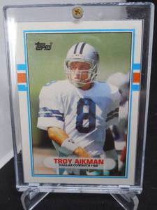 lot 142 image: 1989 Topps Traded Troy Aikman Rookie Card #70T