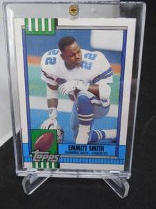 lot 143 image: 1990 Topps Traded Emmitt Smith Rookie Card #27T