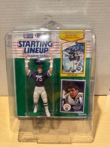 lot 335 image: 1990 Starting Lineup with Protector - Keith Millard