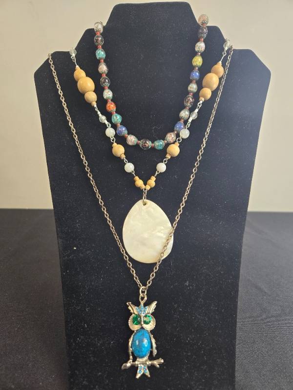lot 64 image: Set of Jewelry with Gemstone Owl Necklace, Beaded Necklace, and Gold-Toned Bracelet - display not inc