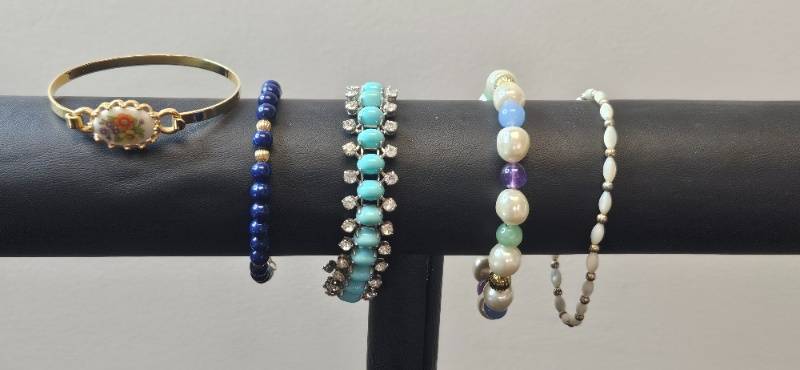 lot 96 image: Vintage Bracelet Collection Including Avon and Floral Cameo Designs - display not inc
