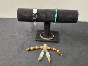 lot 38 image: Set of Assorted Bohemian Style Jewelry Pieces Inc 3 Bracelets and 1 Possible Pendant Or NecklaceBracelet Piece - display not inc