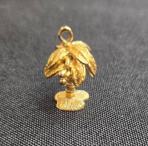 lot 49 image: Vintage Monet Gold Tone Plated Palm Tree Charm