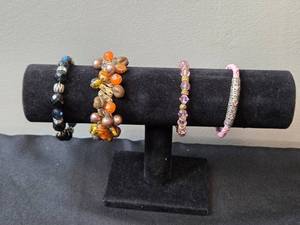 lot 62 image: Set of 4 Handmade Beaded and Leather Bracelets - display not inc