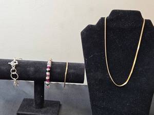 lot 63 image: Set of 3 Fashion Bracelets and 1 Gold-Tone Chain Necklace