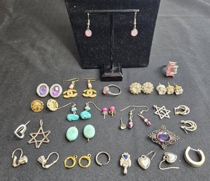 lot 101 image: Assorted Lot of Fashion Jewelry with Earrings, Rings, and Pendants