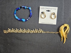 lot 117 image: Assorted Jewelry Gold Tone Bracelet, Gold Brooch, Beaded Bracelet, and Liz Claiborne Earrings