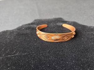 lot 144 image: Vintage Copper Cuff Bracelet with Engraved Design