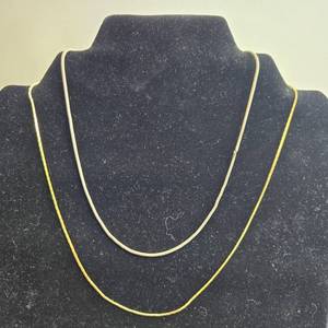 lot 168 image: Assorted Chains and Commemorative Pin from Hong Kong