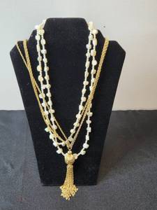 lot 198 image: Collection of Gold Tone and Faux Pearl Necklaces with Tassel Accents - display not inc