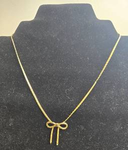 lot 204 image: Goldtone Jewelry Set with Avon Necklace and Holiday Brooch Collection