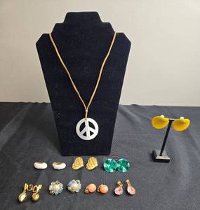lot 210 image: Vintage Jewelry Collection Peace Sign Pendant Necklace w Leather Rope & Clip-On Earrings - display not inc