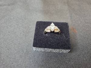 lot 234 image: Xavier Triangular Cut Faux Diamond Costume Engagement Ring with Intricate Band
