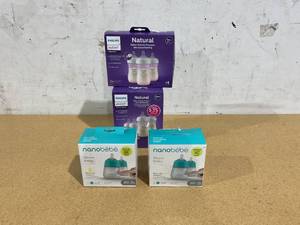 lot 363 image: LOT OF 4 Baby Bottles