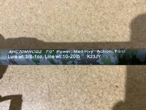 lot 324 image: Lews American Hero Camo Baitcast Combo - 7 - Medium Heavy - 10-20 lbs. Line Weight AHC70MHCG2
