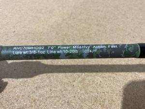 lot 333 image: Lews American Hero Camo Baitcast Combo - 7 - Medium Heavy - 10-20 lbs. Line Weight AHC70MHCG2