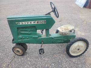 WOW Vintage Oliver 1850 Pedal Tractor  This is an awesome Vintage Tractor Shipping available on this lot with an ADDITIONAL $40 Packing &amp; Handling Fee Due to its Weight and Size