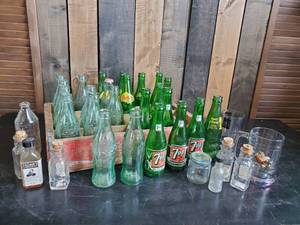 lot 46 image: Coca cola Crate with Vintage Soda Bottles, RARE  7Up with Woman Front, Vintage Small Jars With Corks and more