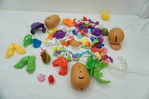 lot 69 image: Mr. Potato Head and accessories