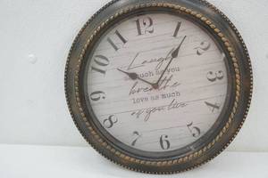 lot 188 image: Laugh as much as you breathe love as much as you live clock