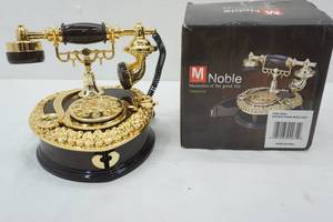 lot 252 image: Antique Phone Music Box - plastic