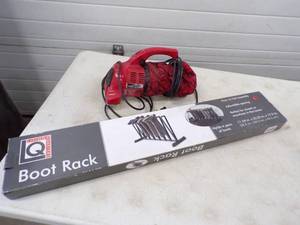 lot 13 image: Dirt Devil Hand Vac and Boot Rack