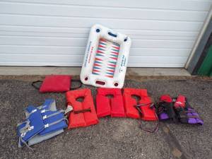 lot 65 image: 5 life Jackets, Seat Flotation and Water Toy