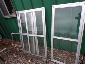 lot 104 image: 4 Storm Windows and extra frames