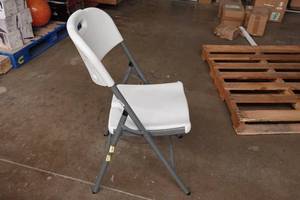 lot 12 image: White Folding Chair