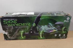 lot 27 image: Side Winder Light-Up Quad Scooter