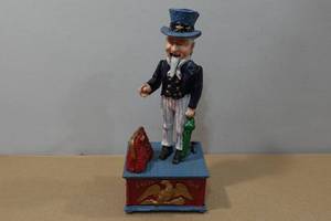 lot 107 image: Cast Iron Mechanical Bank - Uncle Sam