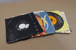 lot 119 image: Assorted 45 RPM Vinyl Records - Beastie Boys, Dolly Parton, The Kinks