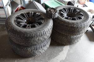 lot 58 image: 18 5-Bolt Universal Rims with Hankook DynaPro ATM P26565R18 Tires