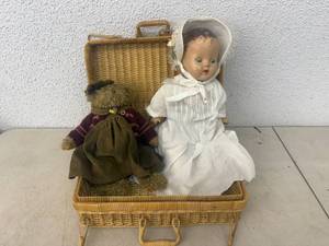 lot 7 image: Vintage Horsman Doll in Basket
