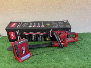lot 57 image: Toro 24 Power Plex Cordless Hedge Trimmer