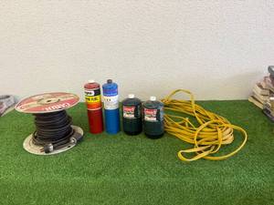 lot 147 image: Propane Canisters & Extension Cords