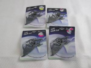 lot 7 image: 4 Visor Clip Guardian Angels...