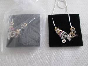 lot 17 image: 2 June Birthstone Charm Necklaces...