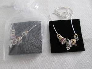 lot 18 image: 2 June Birthstone Charm Necklaces...