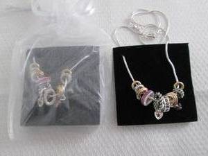 lot 19 image: 2 June Birthstone Charm Necklaces...