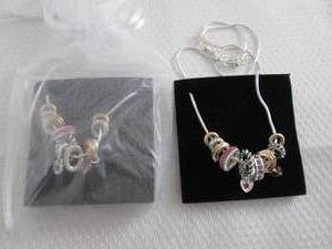 lot 20 image: 2 June Birthstone Charm Necklaces...