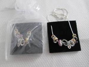 lot 22 image: 2 June Birthstone Charm Necklaces...
