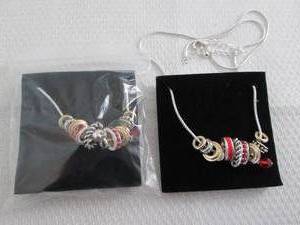 lot 25 image: 2 July Birthstone Charm Necklaces...