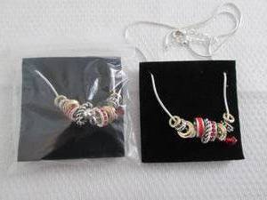 lot 26 image: 2 July Birthstone Charm Necklaces...