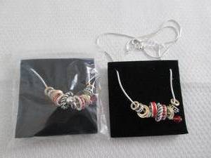 lot 27 image: 2 July Birthstone Charm Necklaces...
