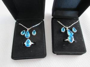 lot 36 image: 2 Dazzling SeaBlue Teardrop Pendant...